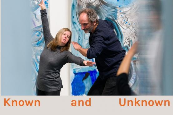 orange lettering Shallal with 2 dancers below an woman and a man in front of blue and grey poster