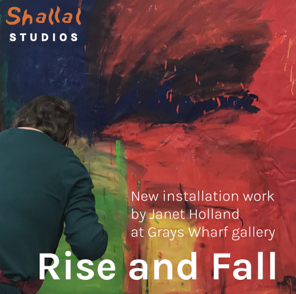 Janet Holland painting a large colourful abstract painting in Shallal Studios