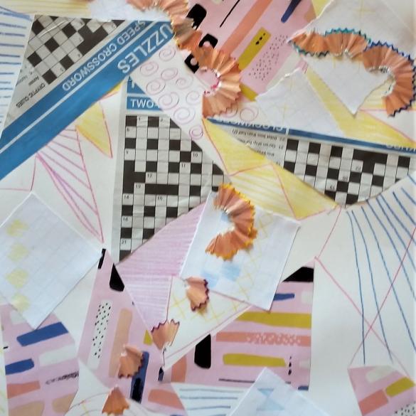 Abstract collage made with wrapping paper, newspaper and pencil shavings in pastel colours