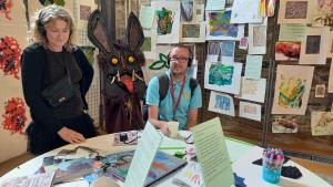 2 people looking at work at Kresen Kernow Underworld exhibition 