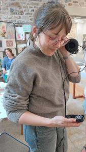 a person listening to headphones