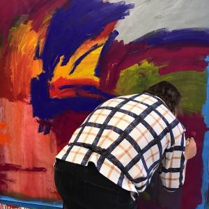 Janet working on a painting