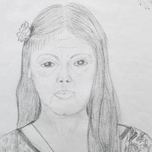 a pencil drawing of a face, neck and shoulders. The figure is wearing a dotty shirt and necklace.