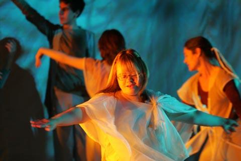 5 people dancing on stage