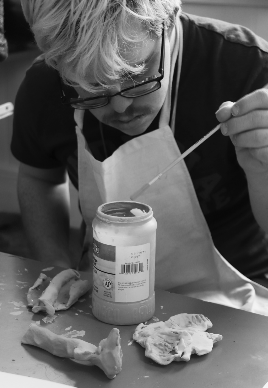 a person painting a bat