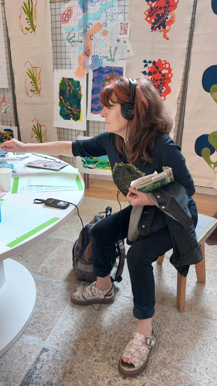 a person listening to headphones